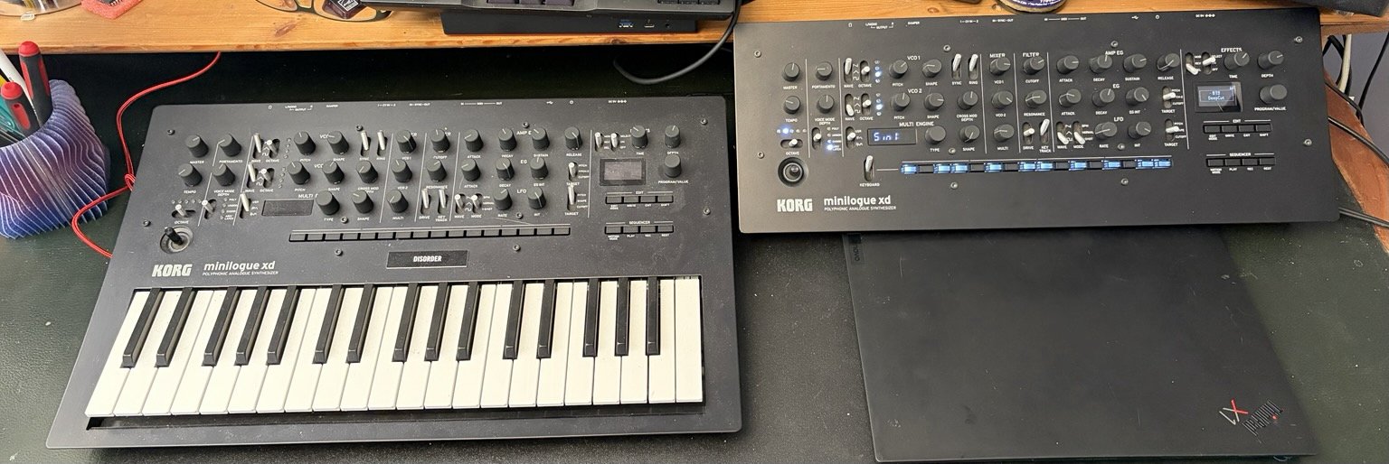 Photo of Korg minilogue xd desktop, to the right of regular minilogue xd