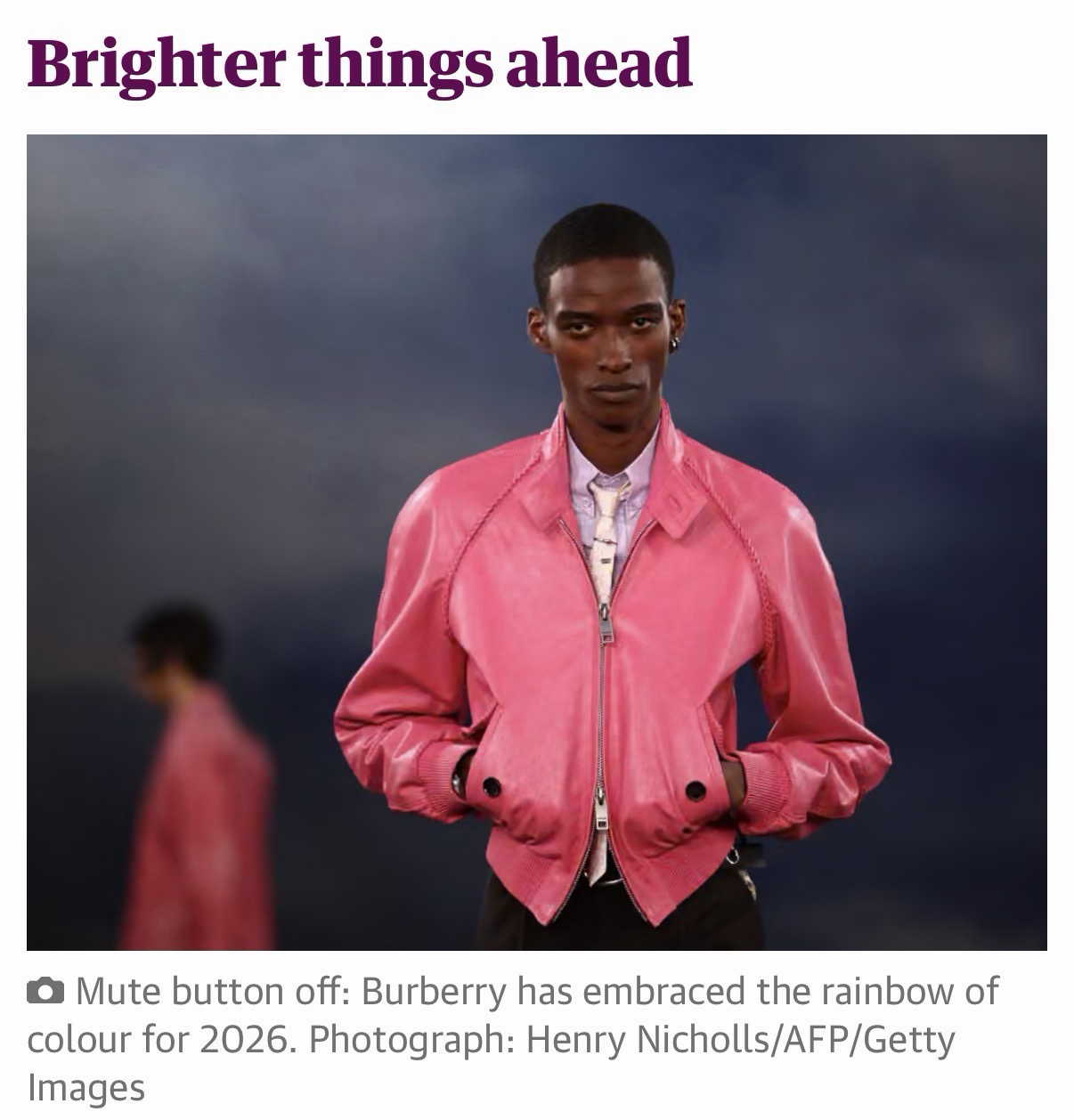 Screen grab of the guardian talking about a bright pink jacket channeling the rainbow 🌈 