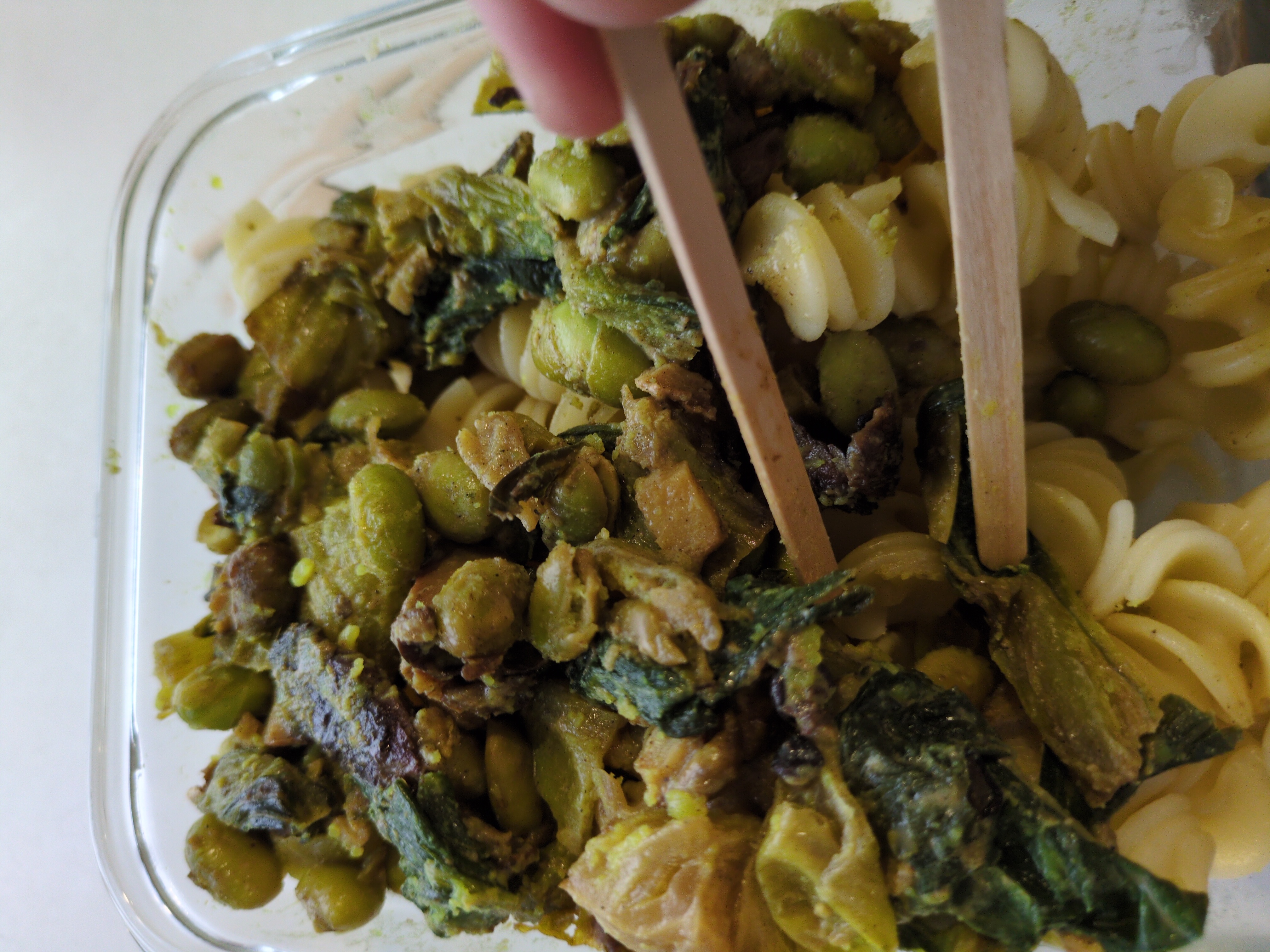 Two sticks for coffee abused as chopsticks