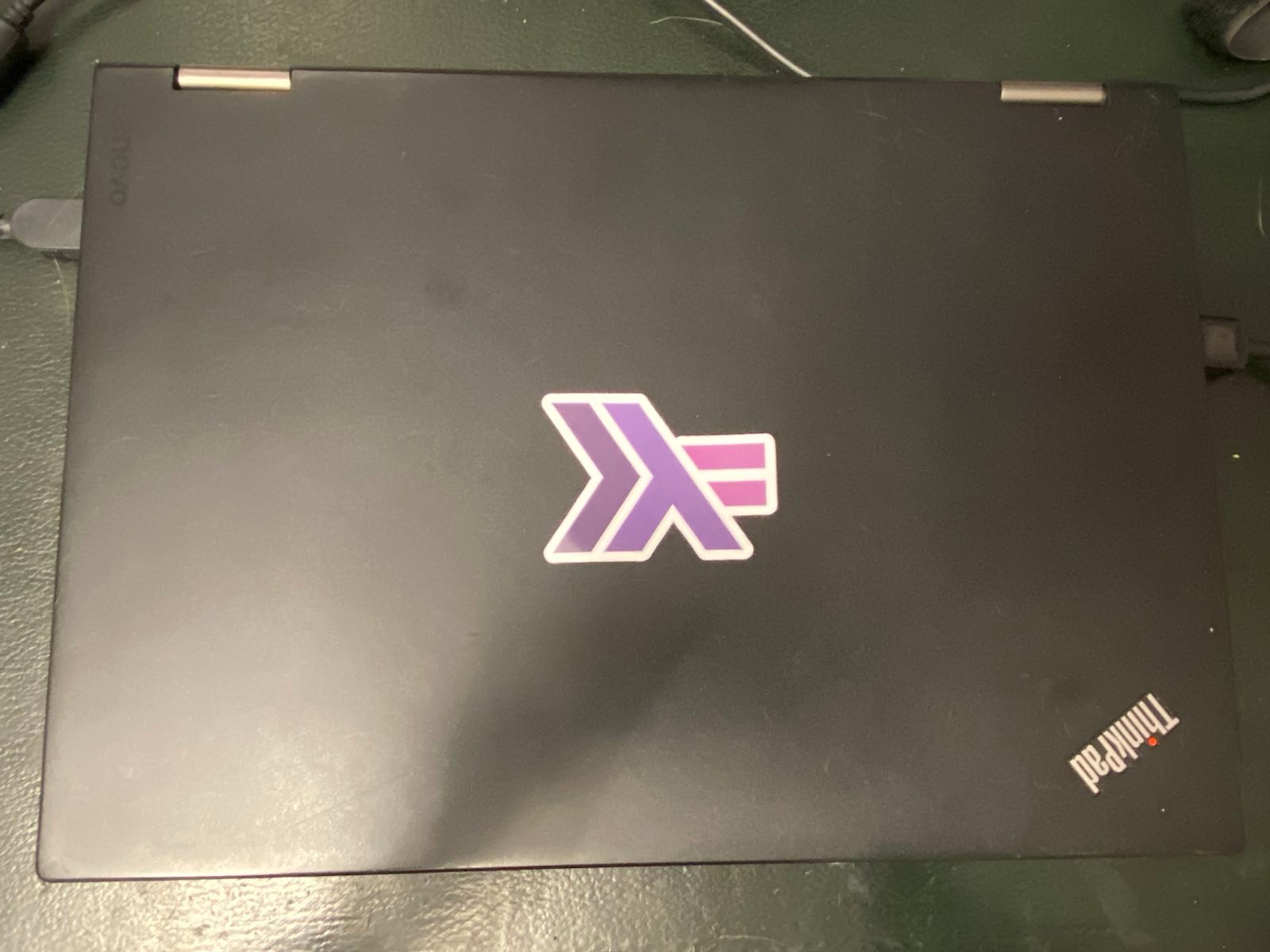 laptop with haskell lambda sticker