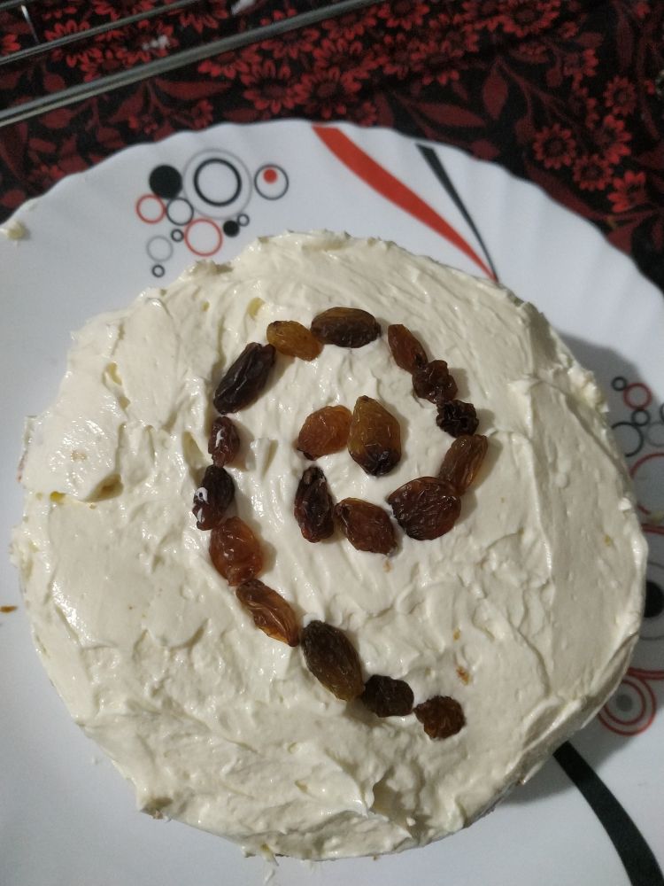 A white cake with Debian swirl on it.